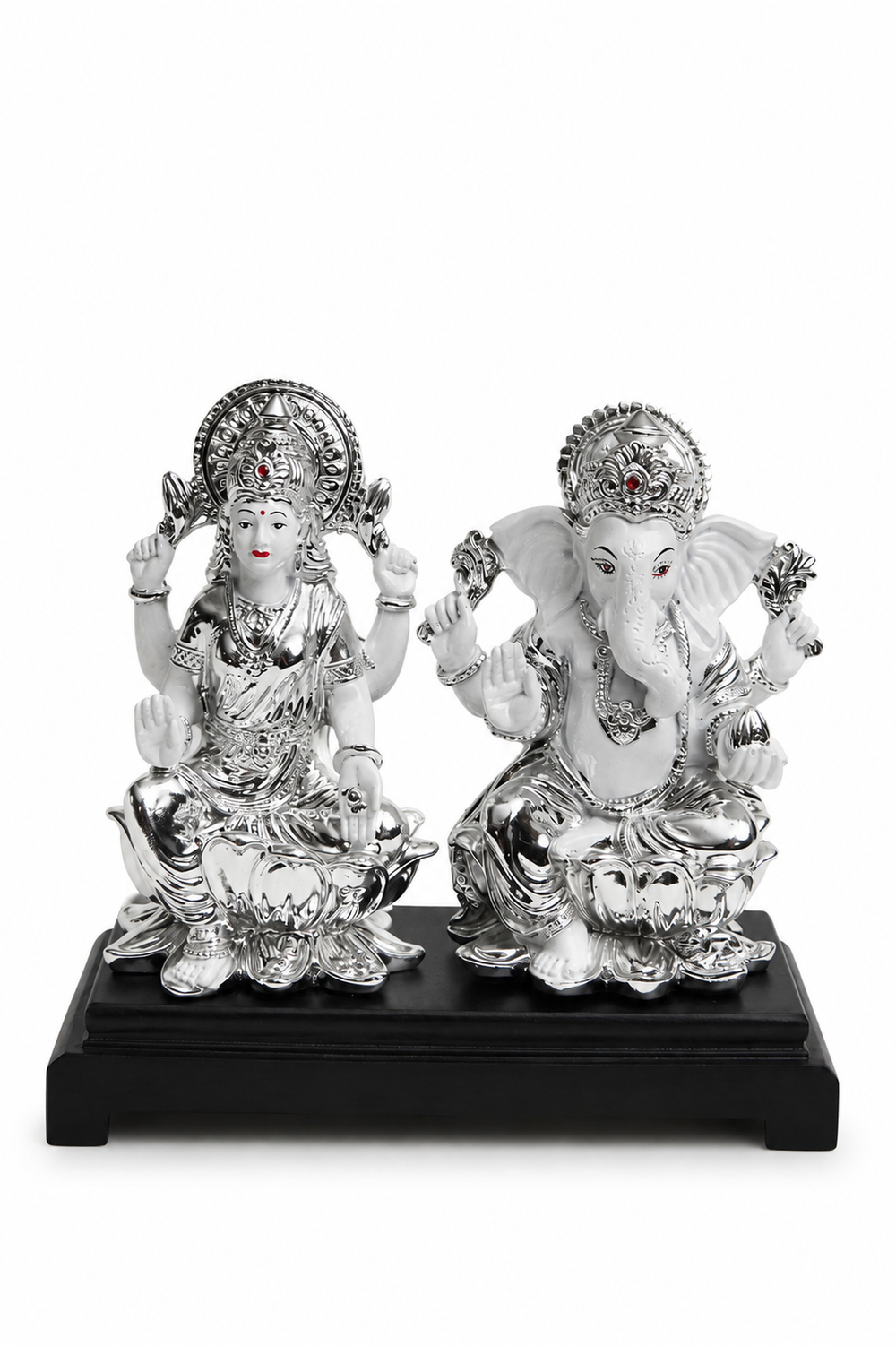 Lakshmi and Ganesha Idol on a Wooden Pedestal