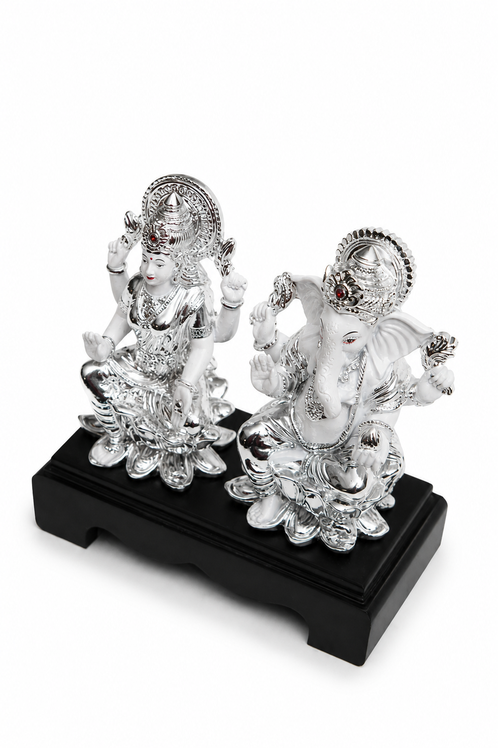 Lakshmi and Ganesha Idol on a Wooden Pedestal