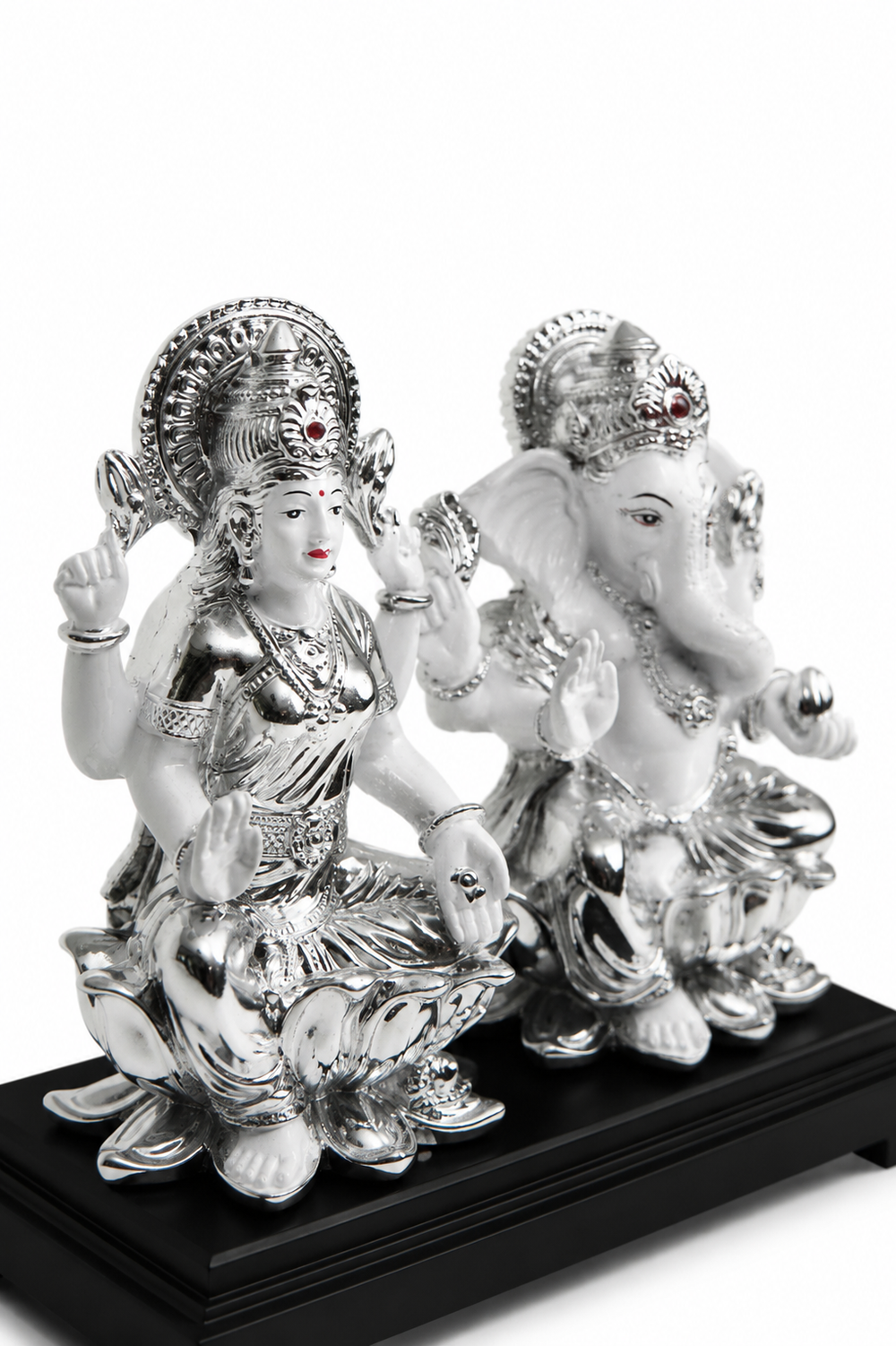 Lakshmi and Ganesha Idol on a Wooden Pedestal