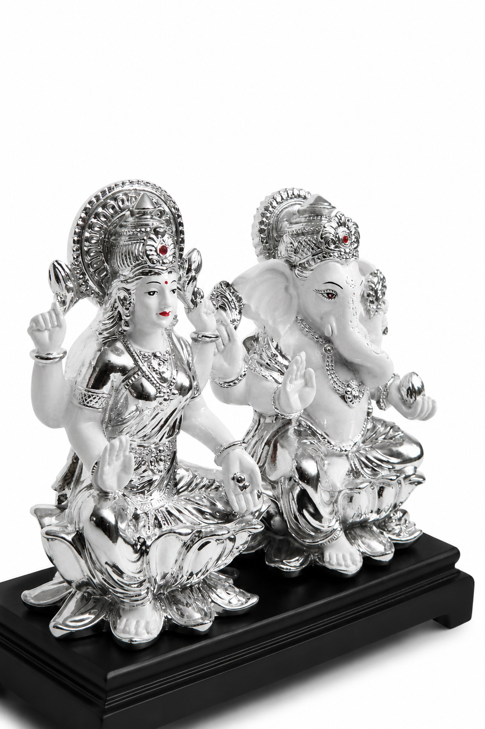 Lakshmi and Ganesha Idol on a Wooden Pedestal